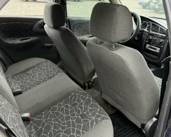 Синий Дэу Ланос, объемом двигателя 1.5 л и пробегом 180 тыс. км за 2500 $, фото 14 на Automoto.ua