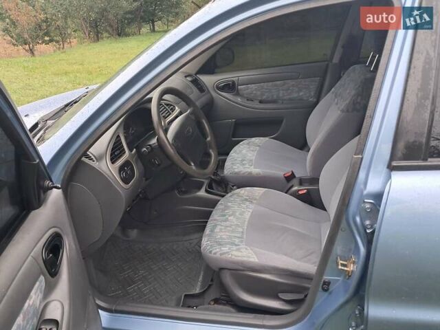 Синий Дэу Ланос, объемом двигателя 1.6 л и пробегом 175 тыс. км за 2350 $, фото 22 на Automoto.ua