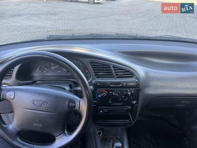 Дэу Ланос 2003 в Черновцах на Automoto.ua Синий Дэу Ланос, объемом двигателя 1.5 л и пробегом 187 тыс. км за 2400 $, фото 10 на Automoto.ua