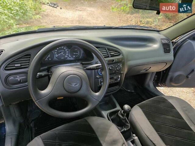 Синій Деу Ланос, об'ємом двигуна 1.5 л та пробігом 109 тис. км за 2400 $, фото 9 на Automoto.ua