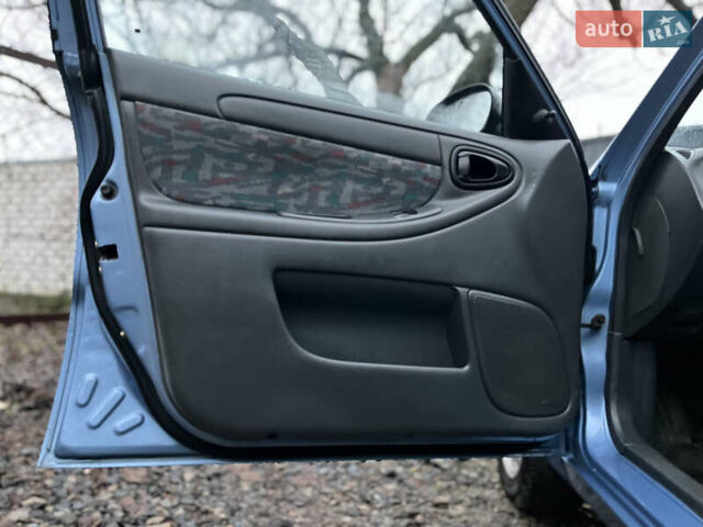 Синий Дэу Ланос, объемом двигателя 1.6 л и пробегом 107 тыс. км за 2999 $, фото 15 на Automoto.ua