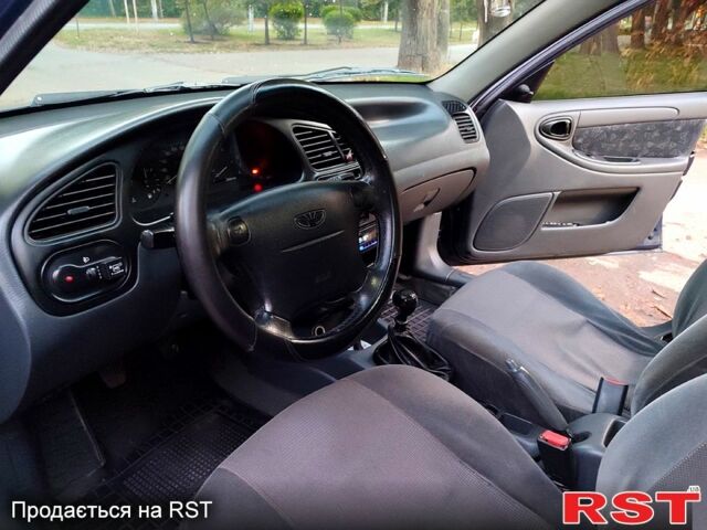 Синий Дэу Ланос, объемом двигателя 1.5 л и пробегом 143 тыс. км за 3100 $, фото 7 на Automoto.ua