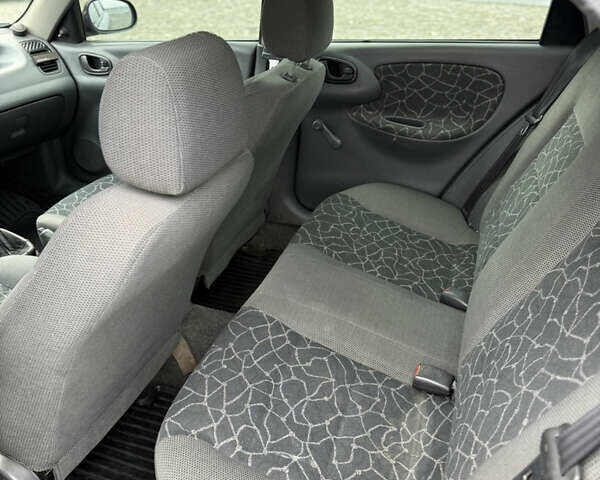 Синий Дэу Ланос, объемом двигателя 1.5 л и пробегом 180 тыс. км за 2500 $, фото 15 на Automoto.ua