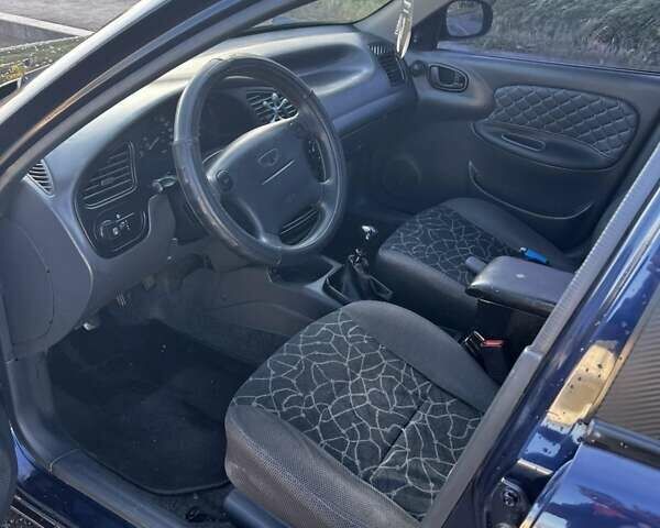 Синій Деу Ланос, об'ємом двигуна 1.6 л та пробігом 347 тис. км за 2400 $, фото 6 на Automoto.ua