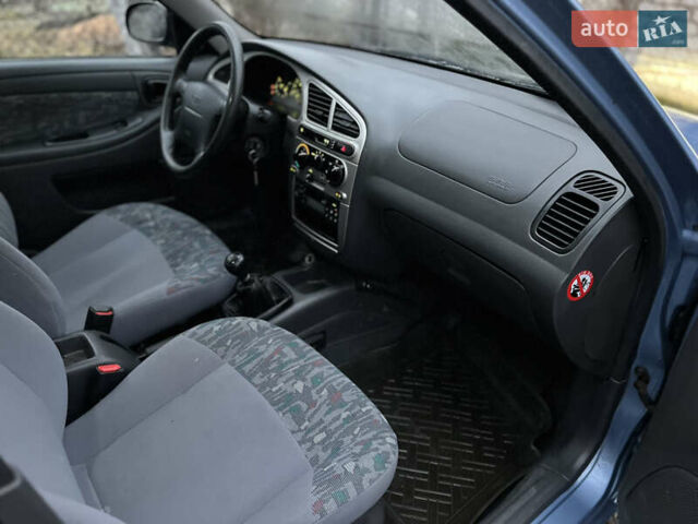 Синий Дэу Ланос, объемом двигателя 1.6 л и пробегом 107 тыс. км за 2999 $, фото 22 на Automoto.ua