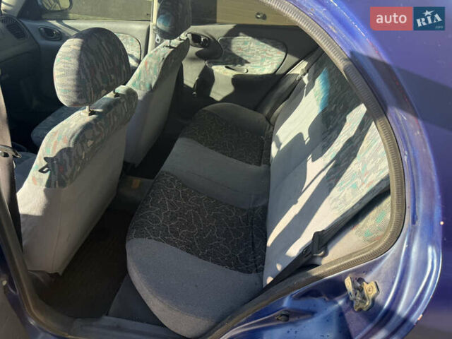 Синий Дэу Ланос, объемом двигателя 0 л и пробегом 666 тыс. км за 875 $, фото 11 на Automoto.ua