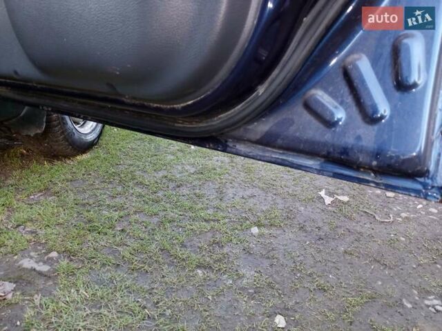 Синий Дэу Ланос, объемом двигателя 1.3 л и пробегом 150 тыс. км за 1650 $, фото 4 на Automoto.ua