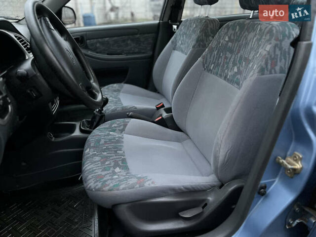 Синий Дэу Ланос, объемом двигателя 1.6 л и пробегом 107 тыс. км за 2999 $, фото 12 на Automoto.ua
