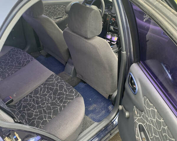 Синий Дэу Ланос, объемом двигателя 1.5 л и пробегом 329 тыс. км за 2400 $, фото 7 на Automoto.ua