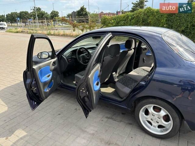 Синій Деу Ланос, об'ємом двигуна 1.5 л та пробігом 173 тис. км за 2700 $, фото 26 на Automoto.ua