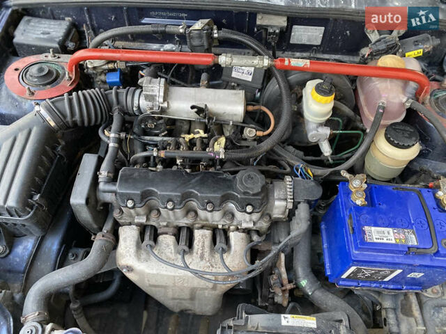 Синий Дэу Ланос, объемом двигателя 1.5 л и пробегом 197 тыс. км за 2550 $, фото 16 на Automoto.ua