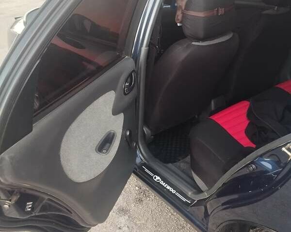 Синий Дэу Ланос, объемом двигателя 1.5 л и пробегом 215 тыс. км за 3100 $, фото 8 на Automoto.ua