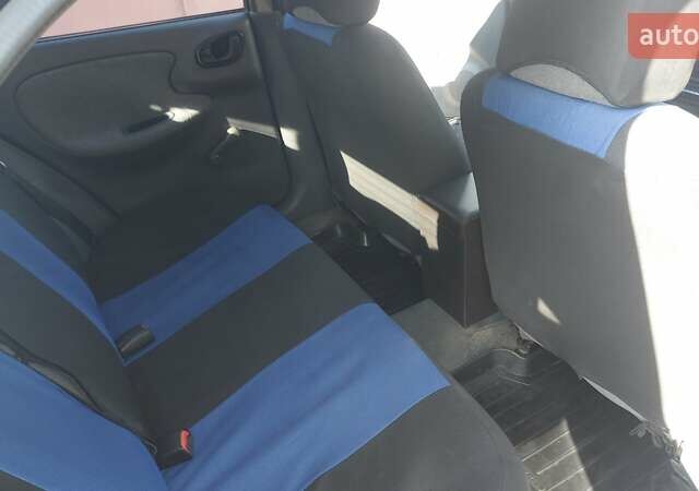 Синий Дэу Ланос, объемом двигателя 1.5 л и пробегом 207 тыс. км за 3100 $, фото 3 на Automoto.ua