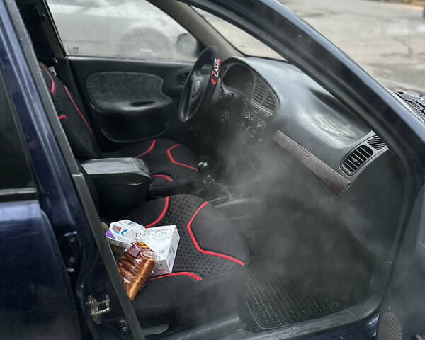 Синий Дэу Ланос, объемом двигателя 1.5 л и пробегом 303 тыс. км за 1450 $, фото 11 на Automoto.ua