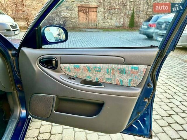 Синий Дэу Ланос, объемом двигателя 1.5 л и пробегом 160 тыс. км за 2200 $, фото 14 на Automoto.ua