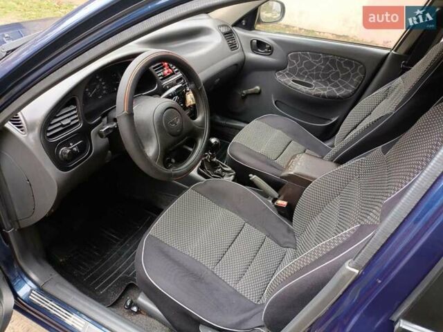 Синий Дэу Ланос, объемом двигателя 1.5 л и пробегом 212 тыс. км за 2550 $, фото 25 на Automoto.ua