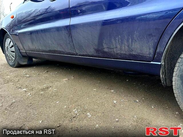 Синий Дэу Ланос, объемом двигателя 1.5 л и пробегом 180 тыс. км за 2100 $, фото 4 на Automoto.ua