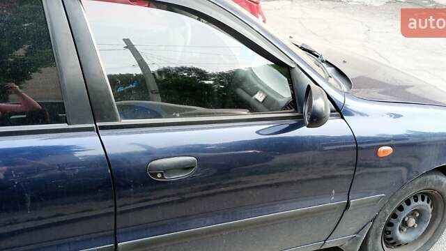 Синий Дэу Ланос, объемом двигателя 1.5 л и пробегом 300 тыс. км за 2850 $, фото 7 на Automoto.ua