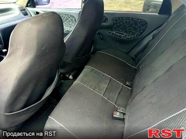 Синий Дэу Ланос, объемом двигателя 1.5 л и пробегом 180 тыс. км за 2100 $, фото 9 на Automoto.ua