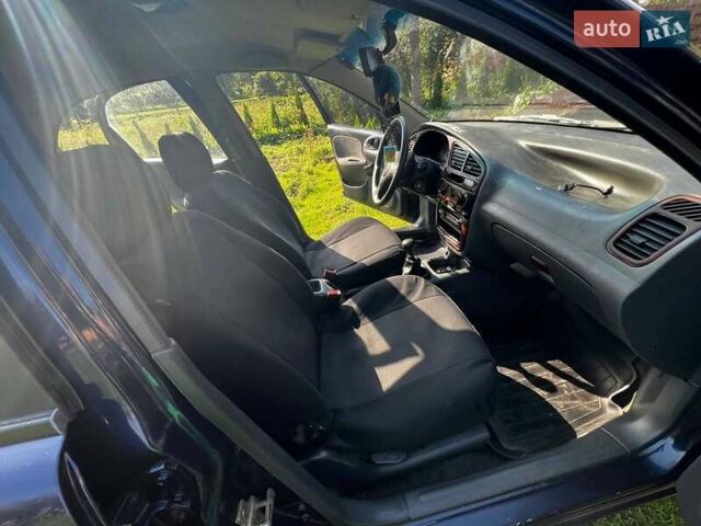 Синий Дэу Ланос, объемом двигателя 1.5 л и пробегом 254 тыс. км за 1800 $, фото 4 на Automoto.ua