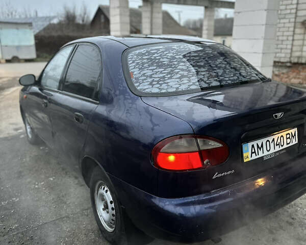 Синий Дэу Ланос, объемом двигателя 1.5 л и пробегом 303 тыс. км за 1450 $, фото 4 на Automoto.ua