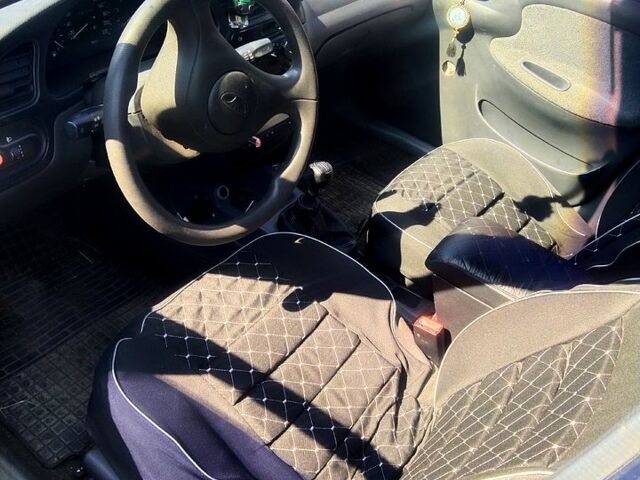 Дэу Ланос 2004 в Полтаве на Automoto.ua Синий Дэу Ланос, объемом двигателя 1.5 л и пробегом 370 тыс. км за 1500 $, фото 12 на Automoto.ua