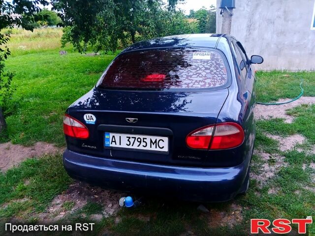Синий Дэу Ланос, объемом двигателя 1.5 л и пробегом 300 тыс. км за 2200 $, фото 4 на Automoto.ua