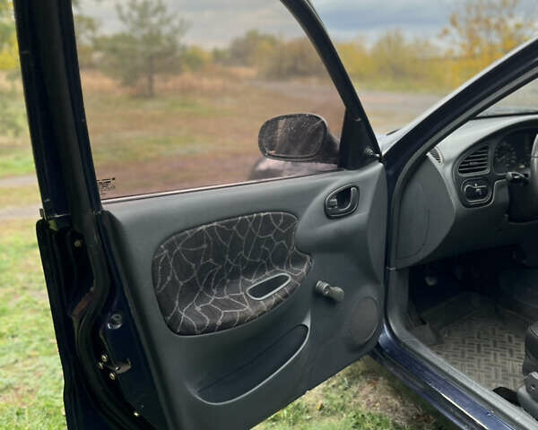 Синий Дэу Ланос, объемом двигателя 1.5 л и пробегом 220 тыс. км за 2300 $, фото 11 на Automoto.ua