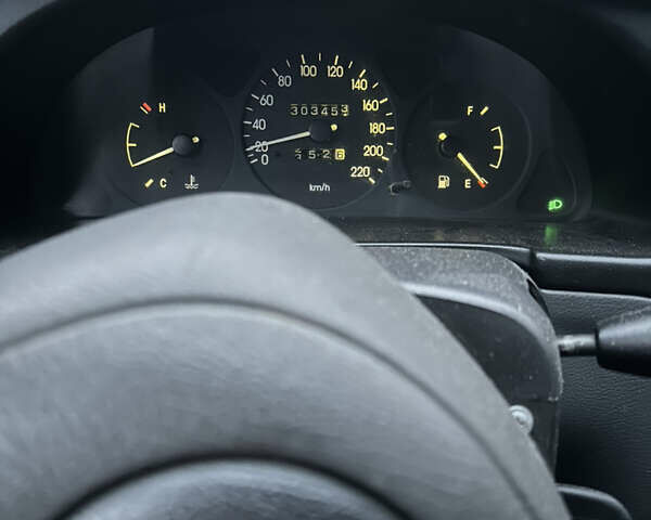 Синий Дэу Ланос, объемом двигателя 1.5 л и пробегом 303 тыс. км за 1450 $, фото 15 на Automoto.ua