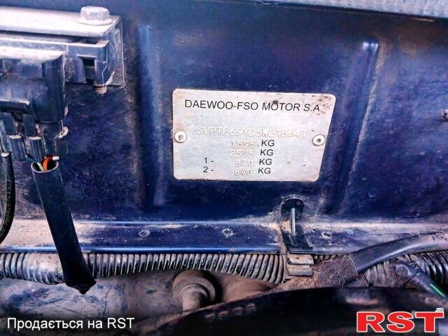 Синий Дэу Ланос, объемом двигателя 1.5 л и пробегом 300 тыс. км за 2200 $, фото 5 на Automoto.ua