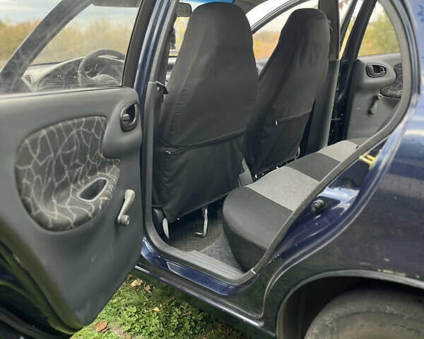 Синий Дэу Ланос, объемом двигателя 1.5 л и пробегом 220 тыс. км за 2300 $, фото 14 на Automoto.ua