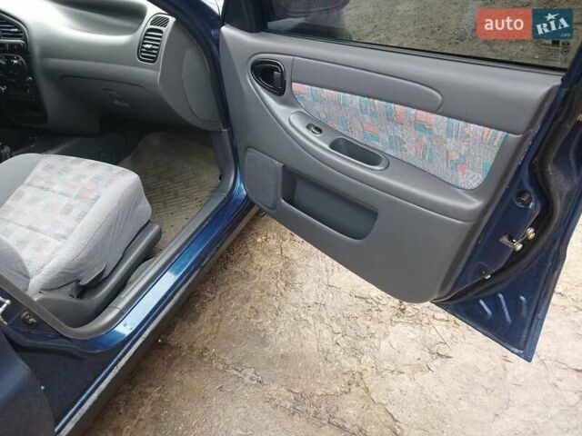 Синий Дэу Ланос, объемом двигателя 1.5 л и пробегом 223 тыс. км за 2199 $, фото 13 на Automoto.ua