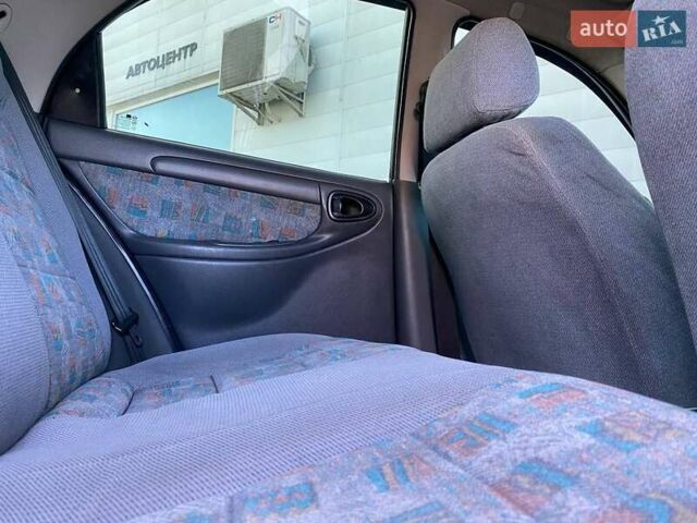 Синий Дэу Ланос, объемом двигателя 1.6 л и пробегом 250 тыс. км за 2900 $, фото 10 на Automoto.ua