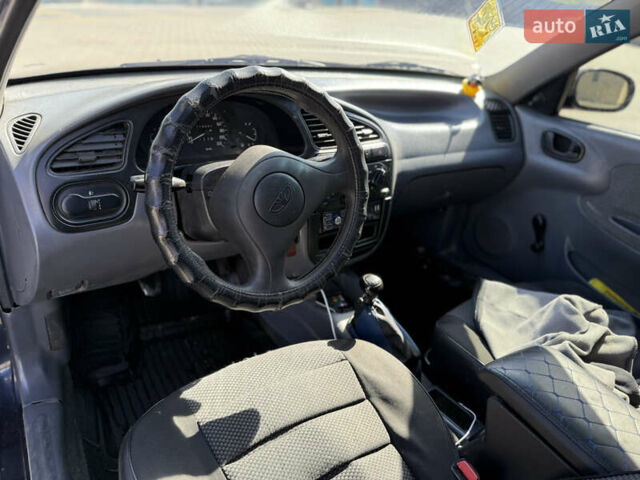Синій Деу Ланос, об'ємом двигуна 1.5 л та пробігом 202 тис. км за 1850 $, фото 12 на Automoto.ua