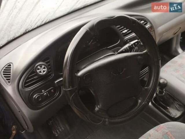 Синий Дэу Ланос, объемом двигателя 1.5 л и пробегом 223 тыс. км за 2199 $, фото 7 на Automoto.ua