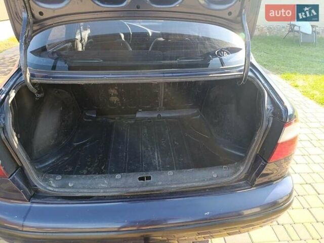 Синій Деу Ланос, об'ємом двигуна 1.5 л та пробігом 236 тис. км за 900 $, фото 5 на Automoto.ua