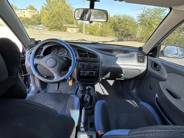 Синий Дэу Ланос, объемом двигателя 1.5 л и пробегом 214 тыс. км за 2500 $, фото 5 на Automoto.ua