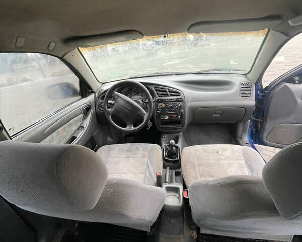 Синий Дэу Ланос, объемом двигателя 1.5 л и пробегом 330 тыс. км за 1399 $, фото 7 на Automoto.ua