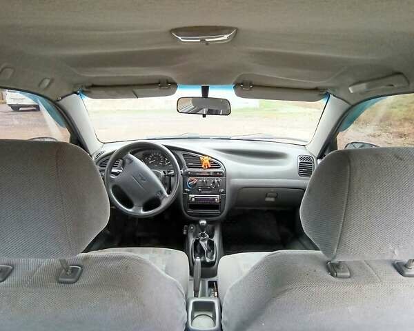 Деу Ланос 2005 у Кривому Розі на Automoto.ua Синій Деу Ланос, об'ємом двигуна 1.5 л та пробігом 200 тис. км за 2300 $, фото 18 на Automoto.ua