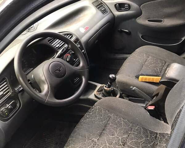 Синий Дэу Ланос, объемом двигателя 1.5 л и пробегом 345 тыс. км за 1550 $, фото 5 на Automoto.ua