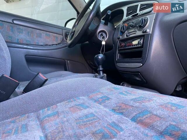 Синий Дэу Ланос, объемом двигателя 1.6 л и пробегом 250 тыс. км за 2900 $, фото 13 на Automoto.ua