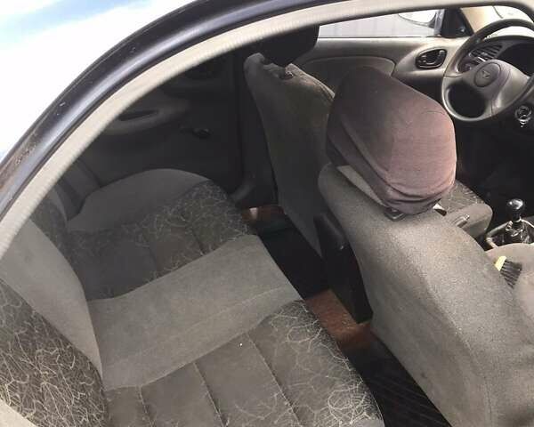 Синий Дэу Ланос, объемом двигателя 1.5 л и пробегом 345 тыс. км за 1550 $, фото 7 на Automoto.ua