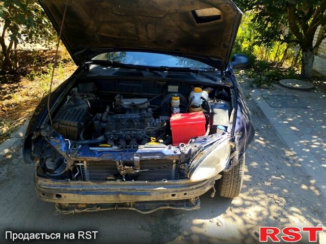 Синий Дэу Ланос, объемом двигателя 1.5 л и пробегом 290 тыс. км за 1200 $, фото 2 на Automoto.ua