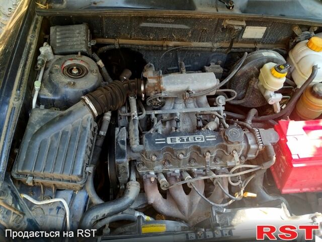 Синий Дэу Ланос, объемом двигателя 1.5 л и пробегом 290 тыс. км за 1200 $, фото 3 на Automoto.ua