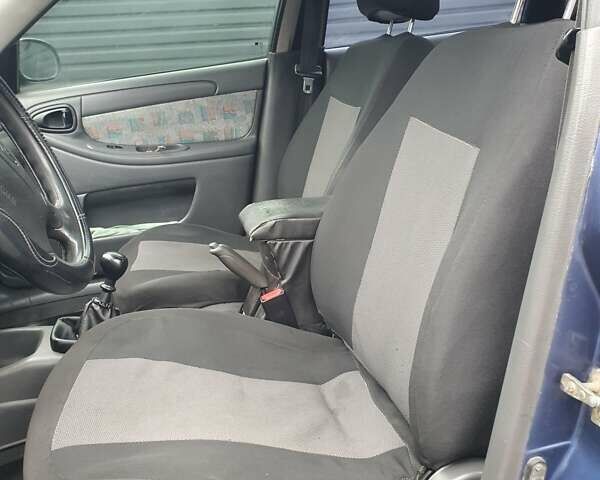 Синий Дэу Ланос, объемом двигателя 1.5 л и пробегом 260 тыс. км за 2250 $, фото 11 на Automoto.ua