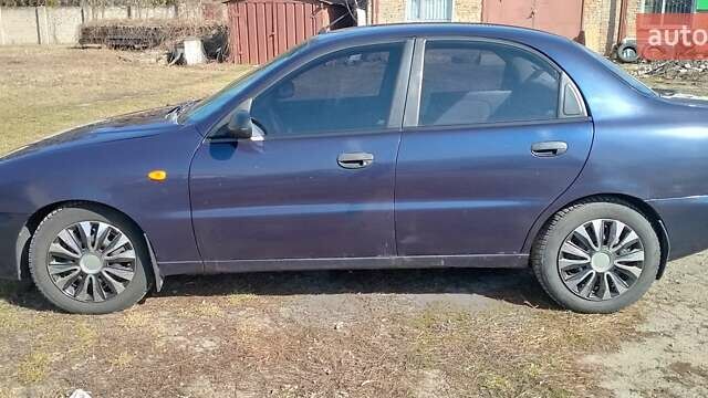 Синий Дэу Ланос, объемом двигателя 1.5 л и пробегом 85 тыс. км за 2000 $, фото 7 на Automoto.ua