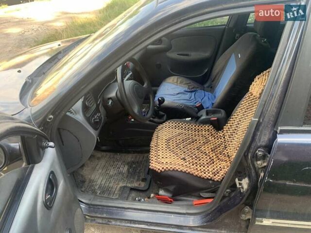 Синій Деу Ланос, об'ємом двигуна 1.5 л та пробігом 240 тис. км за 1500 $, фото 1 на Automoto.ua