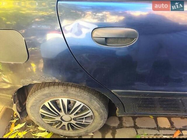 Синий Дэу Ланос, объемом двигателя 1.5 л и пробегом 228 тыс. км за 1650 $, фото 16 на Automoto.ua