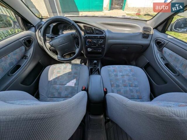 Синий Дэу Ланос, объемом двигателя 1.5 л и пробегом 217 тыс. км за 1550 $, фото 28 на Automoto.ua