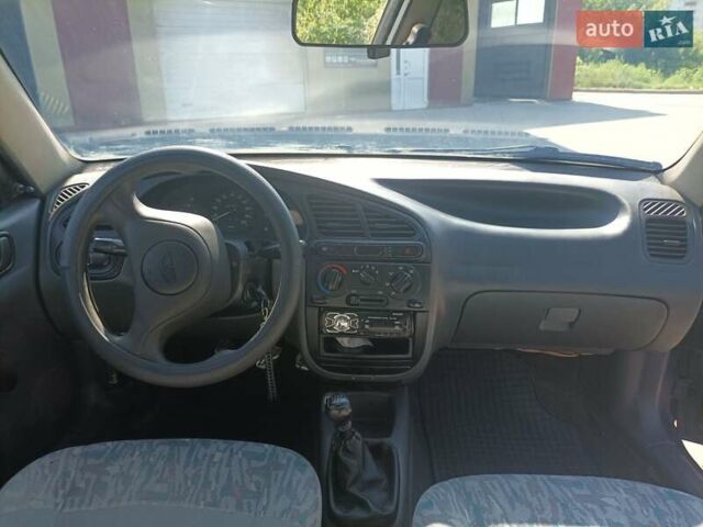 Синий Дэу Ланос, объемом двигателя 1.5 л и пробегом 224 тыс. км за 1999 $, фото 1 на Automoto.ua